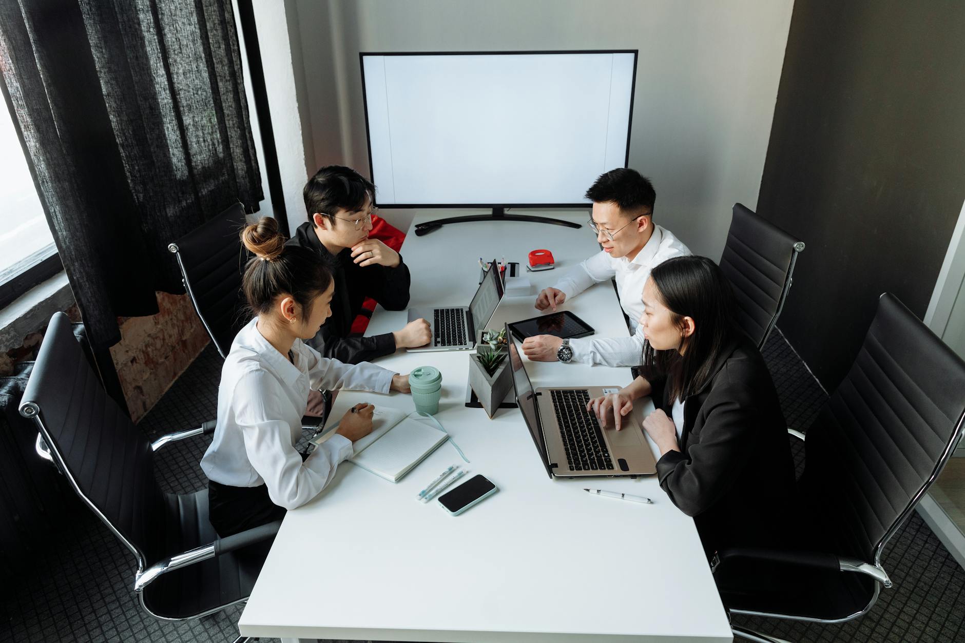 Agency team collaborating after replacing Monday.com with a WordPress project manager